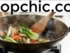 Essential Tips to Extend the Life of Your Carbon Steel Wok (Updated) Well-seasoned carbon steel wok with dark patina demonstrating proper care and maintenance - ChopChic.com