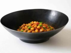 Things to Consider When Choosing a Wok: Features and Tips for Buying the Perfect Wok _Diverse collection of woks including round and flat bottom styles for material and size comparison - ChopChic.com