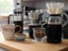 Understanding Coffee Bloom: Why It Matters in Brewing? Fresh coffee grounds bubbling and rising during the bloom phase of a pour over brew - ChopChic.com