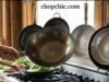 Best Lightweight Woks for Seniors or Beginners _A senior person easily tossing vegetables in a lightweight carbon steel wok, demonstrating strain-free cooking for beginners.