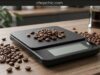 How to Calibrate Your Coffee Scale for Accurate Measurements _A close-up of a stainless steel 500-gram calibration weight resting exactly in the center of a digital coffee scale, which displays a precise 500.0-gram reading to confirm the internal load cell's accuracy.