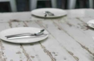 Dishwasher-Safe and Rust-Free Satin Silverware Sets! _Side-by-side texture comparison of satin finish flatware versus brushed steel cutlery on a linen napkin - ChopChic.com