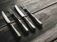 Vintage-Inspired Silverware Sets Vintage inspired silverware set with intricate handles styled for a modern elegant dinner - ChopChic.com