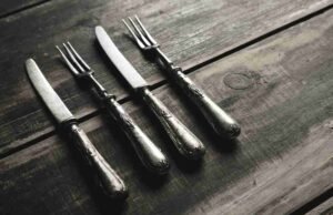 Vintage-Inspired Silverware Sets Vintage inspired silverware set with intricate handles styled for a modern elegant dinner - ChopChic.com