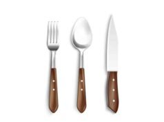 How Do Handcrafted Cutlery Sets Affect People? Rustic wood-handled fork and spoon set styled for a cozy Scandinavian kitchen dining table - ChopChic.com