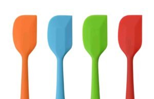 GIR vs. OXO Good Grips Silicone Spatula Comparison: Which One Is Better? Stylish heat resistant rubber scraper spatula scraping batter from a bowl - ChopChic.com