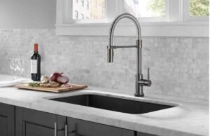 Delta Faucet Trinsic Pro VoiceIQ Review: The Smartest Kitchen Upgrade Yet OWOFAN kitchen faucet with pull down sprayer installed in modern kitchen sink review - ChopChic.com