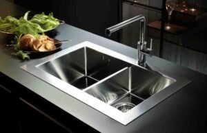 Top 10 Modern Kitchen Faucets That Combine Style and Function _Modern smart kitchen faucet with voice control features in a sleek minimalist design - ChopChic.com