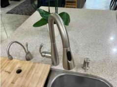 Things to Do Before Buying the Moen Essie MotionSense Faucet -Waving hand over Moen Essie MotionSense faucet to test touchless activation sensitivity - ChopChic.com