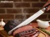 Victorinox Fibrox Pro Boning Knife Review: Why It Is The Industry Standard _12-inch Granton edge brisket knife slicing smoked meat with full tang balance - ChopChic.com