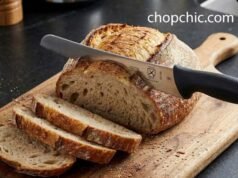 The Best Oil for Wooden Cutting Boards: Mineral Oil vs. Synthetic Alternatives _Mercer Culinary 10-inch wide wavy edge bread knife slicing crusty sourdough loaf without crushing - ChopChic.com