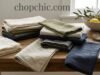 Linen & Textiles: Selecting and Caring for High-Quality Napkins & Cloths _Close-up of high-quality real linen napkins with natural texture, contrasting with slippery synthetic polyester fabrics.