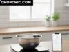 Goodbye, Measuring Cups: Are Smart Kitchen Scales Worth the Hype? _A digital smart kitchen scale connected to a tablet displaying a baking recipe app next to a bowl of flour.