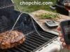 Review of Wireless Meat Thermometers: Worth the Hyping? Wireless meat thermometer probe inserted into a roast inside an oven, monitoring internal temperature without opening the door.
