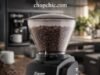 Is the Baratza Encore Still the King of Entry-Level Grinders? _A side-by-side comparison of the classic Baratza Encore and the new Baratza Encore ESP, highlighting the differences in the adjustment collar and bin design for espresso preparation.