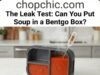 The Leak Test: Can You Put Soup in a Bentgo Box? _A Bentgo box undergoing a leak-proof test with water, soup, and salad dressing to verify if it is safe for backpacks.