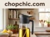 YARRAMATE 2-in-1 Review: Why 40,000 People Buy This Hybrid Bottle Every Month _A close-up of the YARRAMATE oil dispenser demonstrating its dual-function nozzle, showing the switch mechanism that toggles between a pour spout for cooking and a spray mist for seasoning.