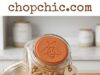ENOLVO Terracotta Brown Sugar Saver Review: The $7 Fix for Hard Sugar _A close-up view of the circular ENOLVO Terracotta Brown Sugar Saver resting inside a clear airtight container filled with soft, clump-free brown sugar, illustrating the active hydration process.