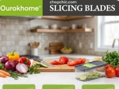 Ourokhome Mandoline Slicer Review: The 6-in-1 Mess Killer? _A red Ourokhome 6-in-1 Mandoline Slicer cutting potatoes into waffle fries directly into its clear collection container, demonstrating the mess-free design and the use of the safety hand guard.