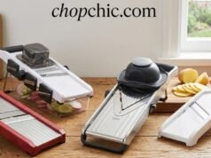 Safe Slicing: The Best Mandoline Slicers with Hand Guards (Rated & Reviewed) _A user slicing vegetables on a stainless steel Gramercy mandoline while wearing grey cut-resistant gloves and using the included plastic hand guard, demonstrating the dual-layer safety protection.