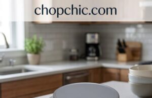 Escali Primo Scale Review: Two Buttons, One Job, Done Well A top-down view of a classic Escali Primo digital kitchen scale on a wooden countertop, displaying its simple two-button interface and a glass bowl of flour resting on the raised plastic weighing platform to demonstrate its functional capacity.