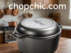 Lodge Double Dutch Oven Review: The Best Sourdough Pot? A black, bare cast iron Lodge 5-Quart Double Dutch Oven on a wooden kitchen counter, specifically configured upside-down so the shallow skillet-lid serves as the base holding a scored, raw sourdough boule, while the deep 5-quart pot hovers above to act as the heavy thermal cover.