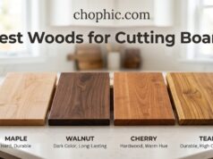 Maple, Walnut or Cherry? The Best Woods for Cutting Boards A top-down view of three premium hardwood cutting boards crafted from light maple, deep walnut, and rich cherry wood, arranged side-by-side with a sharp Damascus chef's knife resting across the surface to demonstrate material contrast.