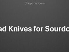 The Best Bread Knives for Sourdough: Protect Your Crumb A side-by-side display on a rustic wooden cutting board featuring a freshly baked artisan sourdough loaf alongside three distinct cutting tools: a classic wooden bow knife, a forged professional serrated blade, and a sleek electric carver.