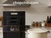 BINO 3-Piece Plastic Cutting Board Review: The Physics of Budget Prep A three-piece set of textured BINO plastic cutting boards in varying sizes arranged on a modern kitchen counter, featuring integrated juice grooves and a stainless steel chef's knife to demonstrate daily prep readiness.