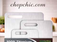 GoodArtificer Titanium Cutting Board Review: Hygienic Marvel or Knife Killer? A sleek, brushed titanium cutting board by GoodArtificer resting on a clean kitchen counter, featuring a sharp professional chef's knife slicing through a vibrant red bell pepper on its highly reflective metallic surface.