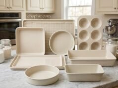 Martha Stewart Gallen Review: The Aesthetic vs. Practicality Trade-off A complete set of Martha Stewart Gallen cookware is displayed on a modern induction cooktop, featuring a diagrammatic inset that illustrates a cross-section of a cream-colored pan, revealing the dark carbon steel core beneath the PFA-free ceramic coating and illustrating efficient thermal conduction.