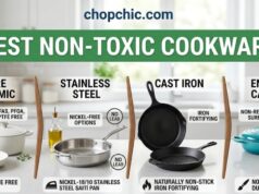 The Best Non-Toxic Cookware: A Complete Safety Guide A side-by-side view of three premium cookware alternatives: a titanium pan searing salmon, a ceramic skillet sautéing vegetables, and a 5-ply stainless steel pan searing steak, arranged on a modern stovetop to illustrate non-toxic options replacing scratched Teflon.
