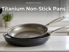Is Titanium Non-Stick Pans Safe? The Real Story A sleek, dark-grey ceramic-infused titanium frying pan resting on a bright induction stovetop, featuring a perfectly cooked, unblemished omelet to showcase its non-toxic, stick-resistant surface without the use of synthetic polymers.