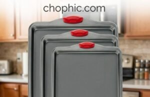 Boxiki Kitchen Carbon Steel Review: Engineering the High-Heat Bake An extreme close-up of a dark gray Boxiki Kitchen heavy-gauge carbon steel baking sheet remaining perfectly flat inside a 420°F oven while evenly roasting vegetables, featuring a diagrammatic overlay illustrating how the thick rim geometry resists thermal torsion and eliminates warping.