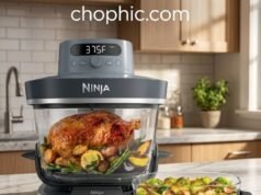 Modular Glass Engineering: Ninja Crispi Pro 6-in-1 Analysis A technical photography of the 1800W Ninja Crispi Pro portable cooking system in a modern kitchen, with the sleek heating pod mounted atop the durable 6-quart borosilicate glass pot. Golden-brown roasted potatoes are visible inside the transparent vessel. Heat waves are subtly illustrated rising from the glass to emphasize thermal performance. Natural lighting, high-end appliance aesthetic. A watermark logo is positioned at the top center of the visual.